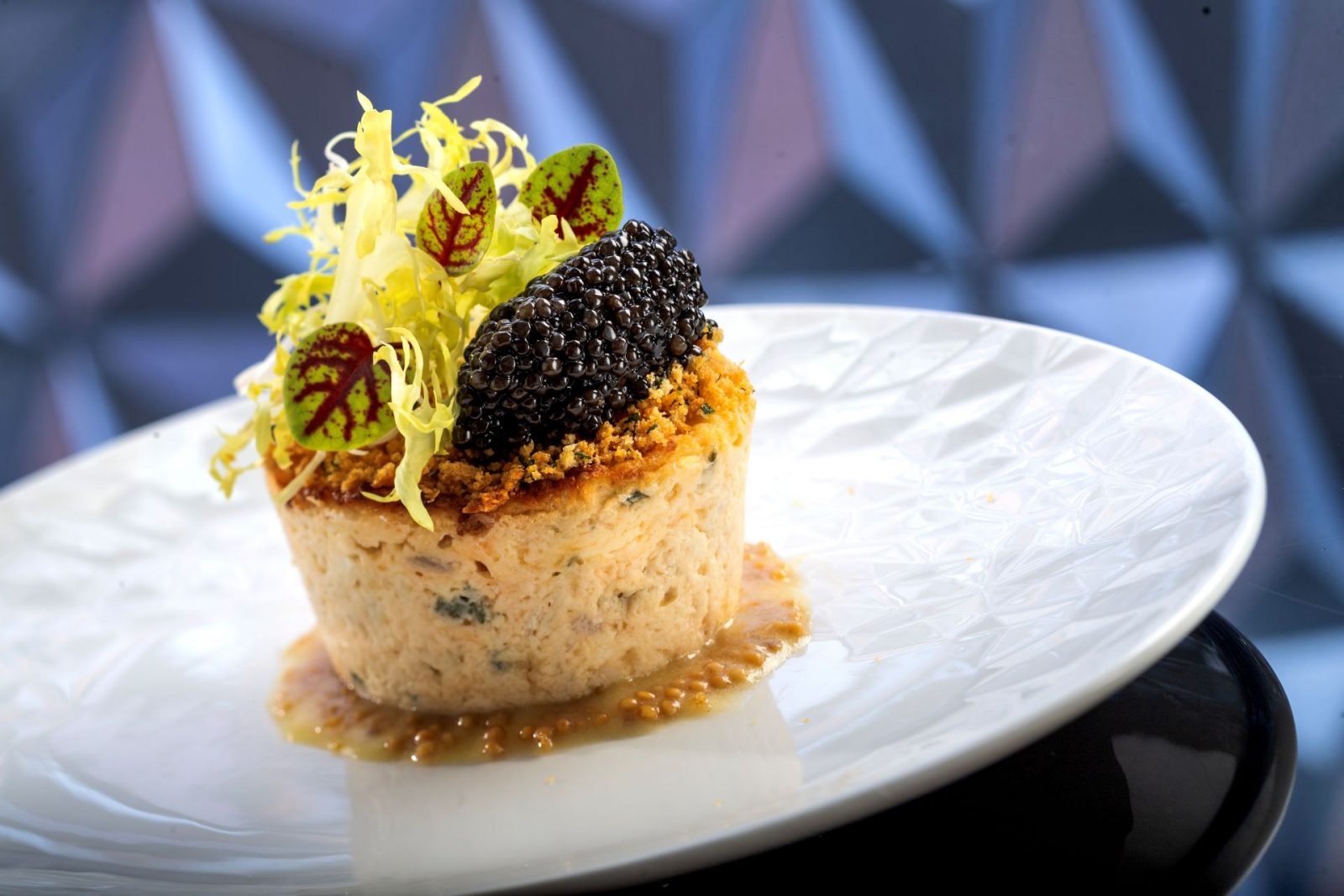 Geo-82 Menu Item: Jumbo Lump Crab Gâteau - Smoked cheddar, pickled mustard seed-lemon vinaigrette, and Siberian Supreme Caviar
